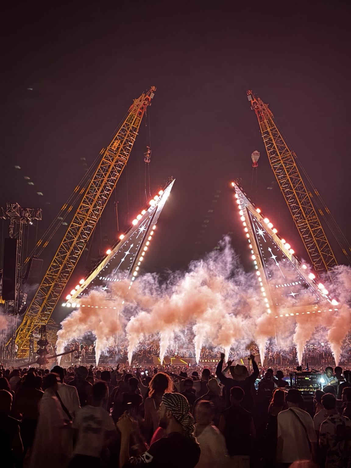Real festival crowd and effects in front of the pyramids